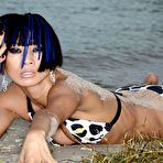 Second pic of Bai Ling sexy posing in bikinies on the beach