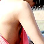 Fourth pic of Bai Ling in short pink dress titslip paparazzi shots