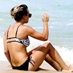 Second pic of Kaley Cuoco wearing a bikini at a pool in Mexico