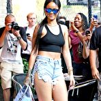Third pic of Rihanna pokies under black short top