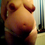 Fourth pic of Preggo sluts posing naked