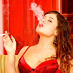 Second pic of Smoking slut with big black toy at wetandpuffy.com