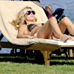 First pic of Abigail Clancy in bikini poolside paparazzi shots in Portocervo