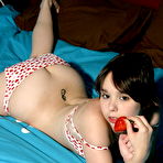 Third pic of Ariel Rebel - Ariel Rebel eating strawberries while posing in her bed wearing her cute lingerie