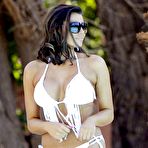 First pic of Busty Jessica Wright poolside in white nikini