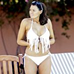 Second pic of Busty Jessica Wright poolside in white nikini