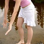 Second pic of Ariel Rebel - Ariel Rebel posing in her cute pink shirt and white skirt at the local lake