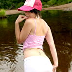 Third pic of Ariel Rebel - Ariel Rebel posing in her cute pink shirt and white skirt at the local lake