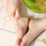 Second pic of Ariel Rebel - Ariel Rebel gets hot on the kitchen floor while slicing the melon to pieces.