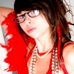 Second pic of Ariel Rebel - Stunning Ariel Rebel plays with a red boa and pearls as well as with her butt.