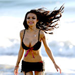 First pic of Tila Tequila deep cleavage in black bikini on the beach