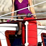 Fourth pic of Paris Hilton caught topless on the boat with her sister