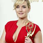 First pic of Kate Winslet in red dress posing at Emmy Awards