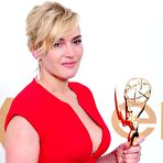 Third pic of Kate Winslet in red dress posing at Emmy Awards
