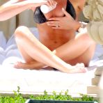 Third pic of Abigail Clancy cameltoe and cleavage poolside