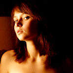 Third pic of Anna S - Anna S slowly undresses in front of the camera and shows her perky little tits.