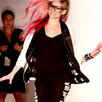 Second pic of Avril Lavigne attends at fashion show podium