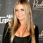 Fourth pic of Carmen Electra shows legs and cleavage