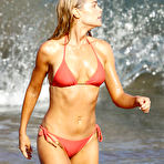 Third pic of Denise Richards sexy in blue and red bikinies on the beach