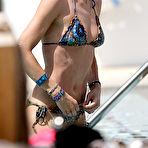 Third pic of Doutzen Kroes wearing a bikini at a pool in Miami