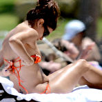 First pic of Eva Longoria nip slip in bikini on the beach