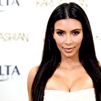 First pic of Kim Kardashian shows legs and cleavage