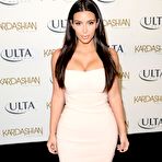 Fourth pic of Kim Kardashian shows legs and cleavage