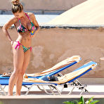 Second pic of Busty Gemma Atkinson sunbathing in sexy bikini