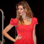 Third pic of Gisele Bundchen posing in short red dress at Colcci fashion show