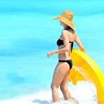 First pic of Heidi Klum wearing black bikini at a beach