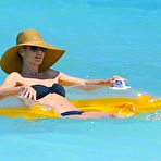 Fourth pic of Heidi Klum wearing black bikini at a beach