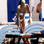 First pic of Manuela Arcuri caught in bikini on the beach in Italy