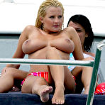 Third pic of Busty Michelle Marsh sunbathing topless on the beach and yacht