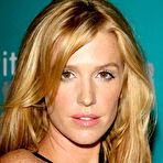Fourth pic of Poppy Montgomery posing at Without A Trace 100th episode celebration