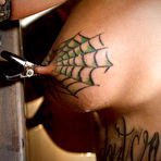 Third pic of SexPreviews - Bonnie Rotten tattoo babe is bound with straps and made to squirt and orgasm