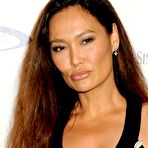 Third pic of Tia Carrere slight cleavage and legs paparazzi shots