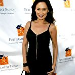 Fourth pic of Tia Carrere shows cleavage at The Fighter premiere
