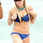 Third pic of Lindsay Lohan boob out on the beach paparazzi shots