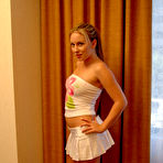First pic of Christie Lee - Seductive teen chick Christie Lee strips her mini skirt and shows her wet pussy.