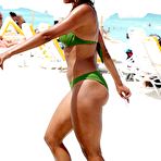 Third pic of Claudia Jordan in green bikini paparazzi shots