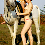 First pic of Eva F, Silvia B - Eva F and Silvia B strip together outdoors and then ride a horse nude together.