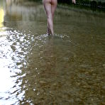 Fourth pic of Irina H - Irina H takes her clothes off by the river and exposes her completely nude body.