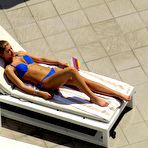 First pic of Amy Willerton sunbathing in blue bikini