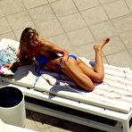 Second pic of Amy Willerton sunbathing in blue bikini