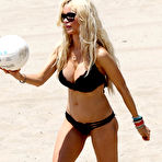 Second pic of Busty Alicia Douvall shows cleavage in a black bikini at Santa Monica Beach