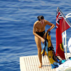 Fourth pic of Carole Bouquet swimming & sunbathing topless on the yacht
