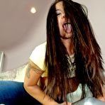 Second pic of Jenaveve Jolie - Jenaveve Jolie takes her sexy blue jeans off and exposes her fantastic tight ass.
