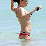 Fourth pic of Katie Cassidy sexy in red bikini on a beach
