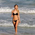 First pic of Petra Benova in black bikini on a beach