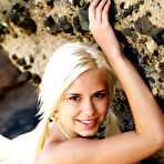 First pic of Lola Myluv - Alluring blonde model Lola Myluv strips on the rocks and shows us her perky tits.